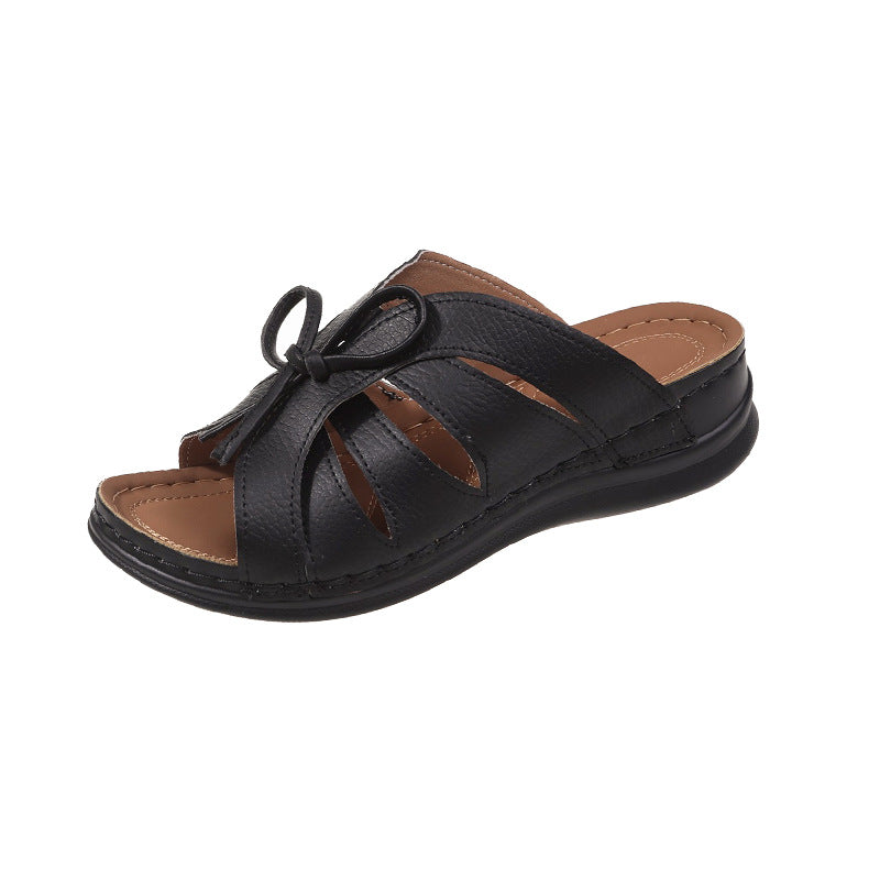 Hollow-out Bow Flat Wedge Slippers