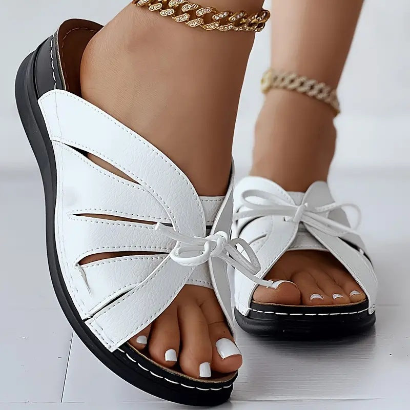 Hollow-out Bow Flat Wedge Slippers