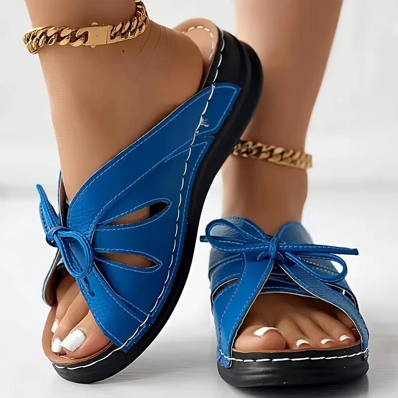 Hollow-out Bow Flat Wedge Slippers