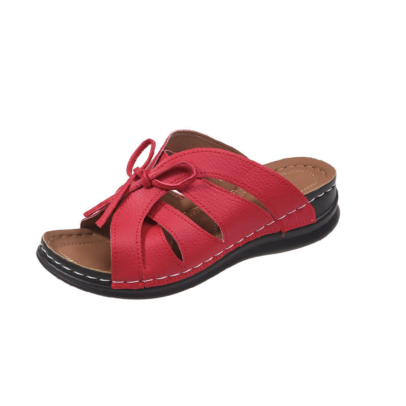 Hollow-out Bow Flat Wedge Slippers